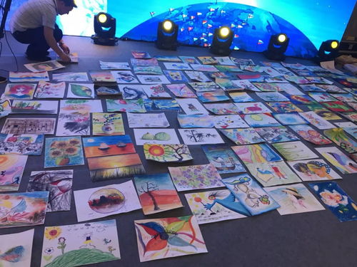 2018年国际少儿美术交流会现场,阳光天使发布最新产品 水溶 韵彩笔 ,简志雄等专家老师前往产品生产基地进行参观